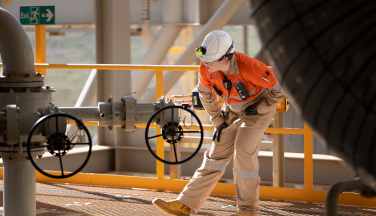 woman checking pipeline