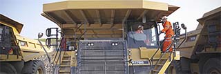 Warranty plus Men on heavy equipment