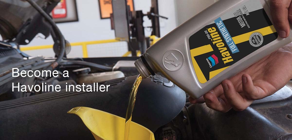 Pouring oil into engine Pouring oil into engine
