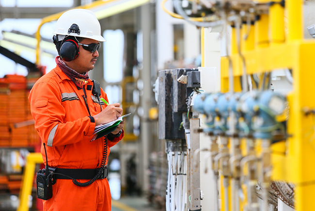 Man inspecting machinery